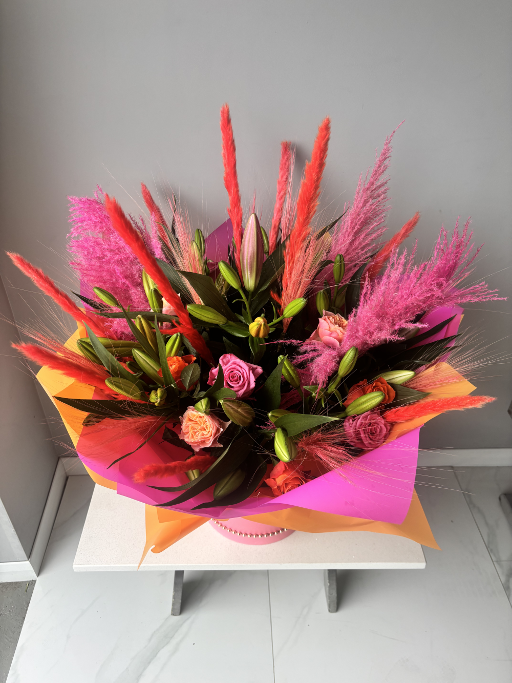 Vibrant Lillie’s, roses & pampas